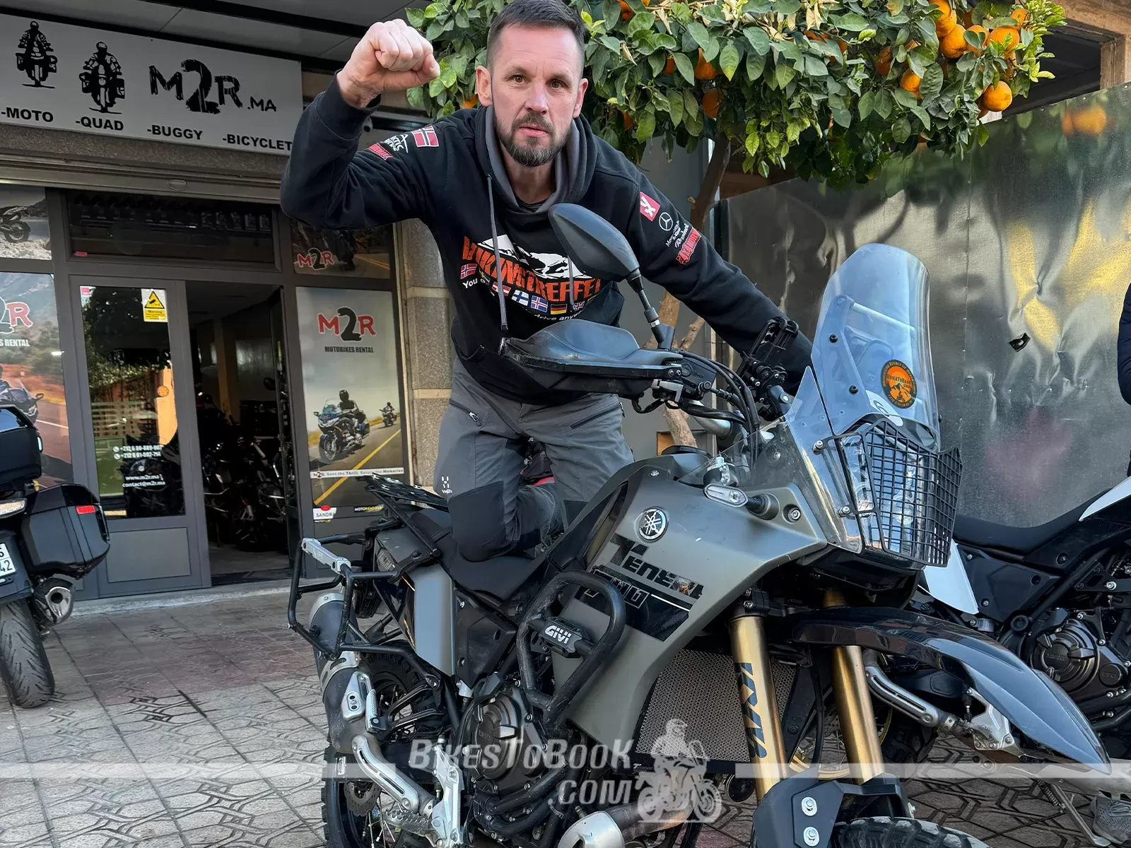 Client departing Marrakech on a rental motorcycle